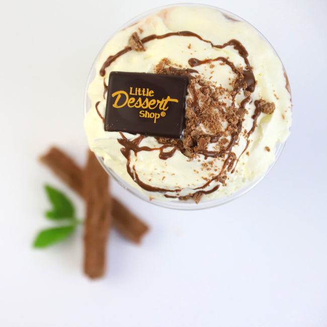 Vanilla gelato and crumbled flake pieces with a signature Little Dessert Shop chocolate on top